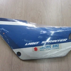 Akció Cache latéral gauche Suzuki 125 RG 1988 (NF12B) 47211-36A00-000